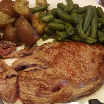 Tish's Restaurant - Canned beans, grisly rib eye and oily overdone potatoes for $25? My mother-in-law has boiled better dinners than this. Never again. - American Near Me - Council Bluffs, Iowa