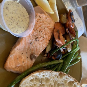 Urban Plates - Salmon plate, $16 base price. The salmon was cooked perfectly. Kinda Oily veggies. - New American Near Me - Dublin, California Urban Plates - Salmon plate, $16 base price. The salmon was cooked perfectly. Kinda Oily veggies. - New American Near Me - Dublin, California