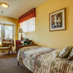 HarborView Senior Assisted Living - A clean and comfortable private bedroom with private bathroom