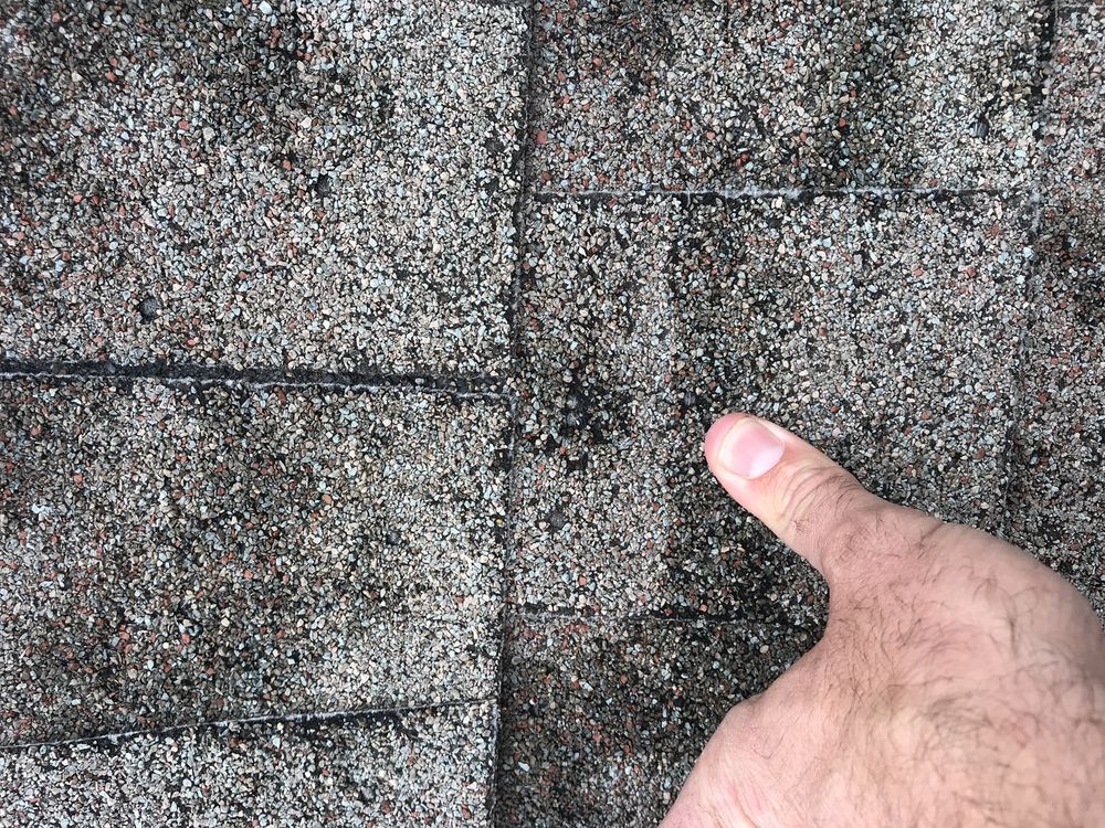 Slide of Advantage Roofing Company