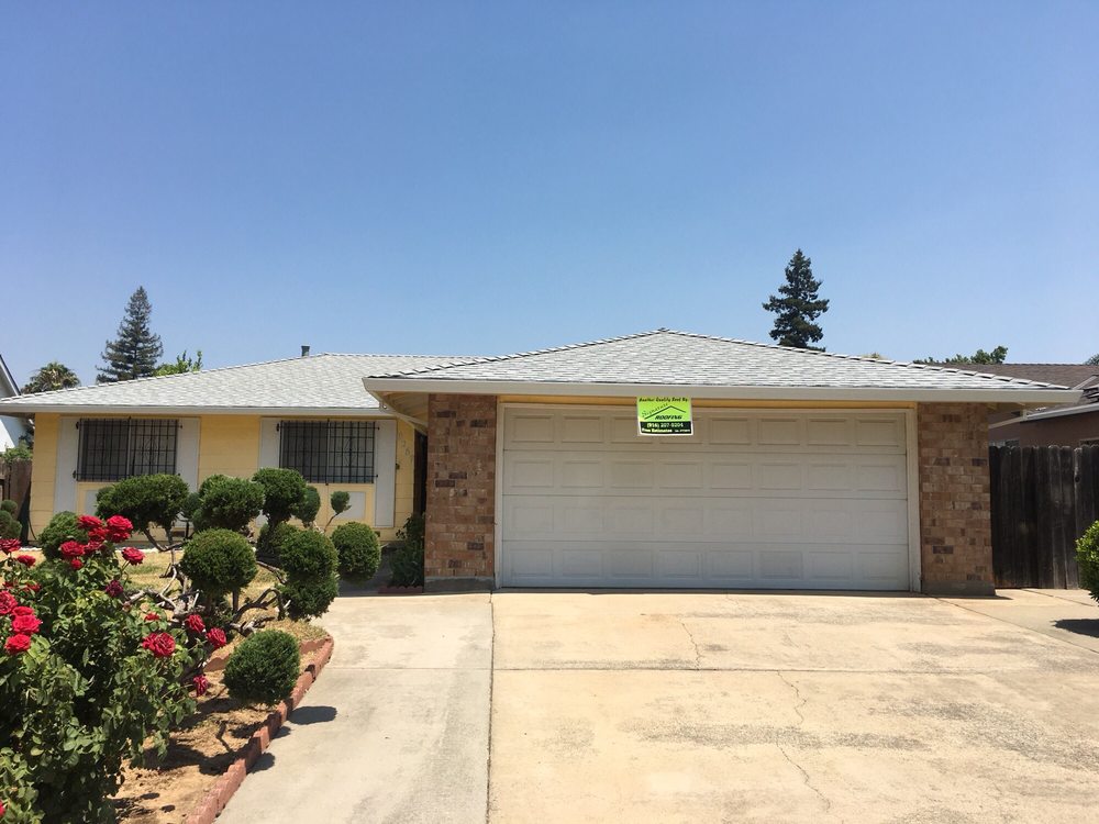 Slide of Signature Roofing