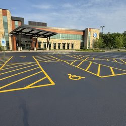 Gaard - Asphalt maintenance at Crusader Clinic on West State in Rockford Illinois