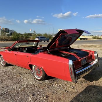Everybody Loves Raymonds - a red car with its hood open - Shaved Ice Near Me - San Antonio, Texas