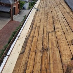 Colonial Roofing Systems - Wood replaced.