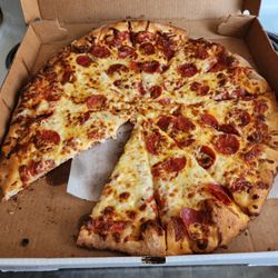 Mac's Pizza Shack - Mac Daddy (18") with Pepperoni and extra cheese.