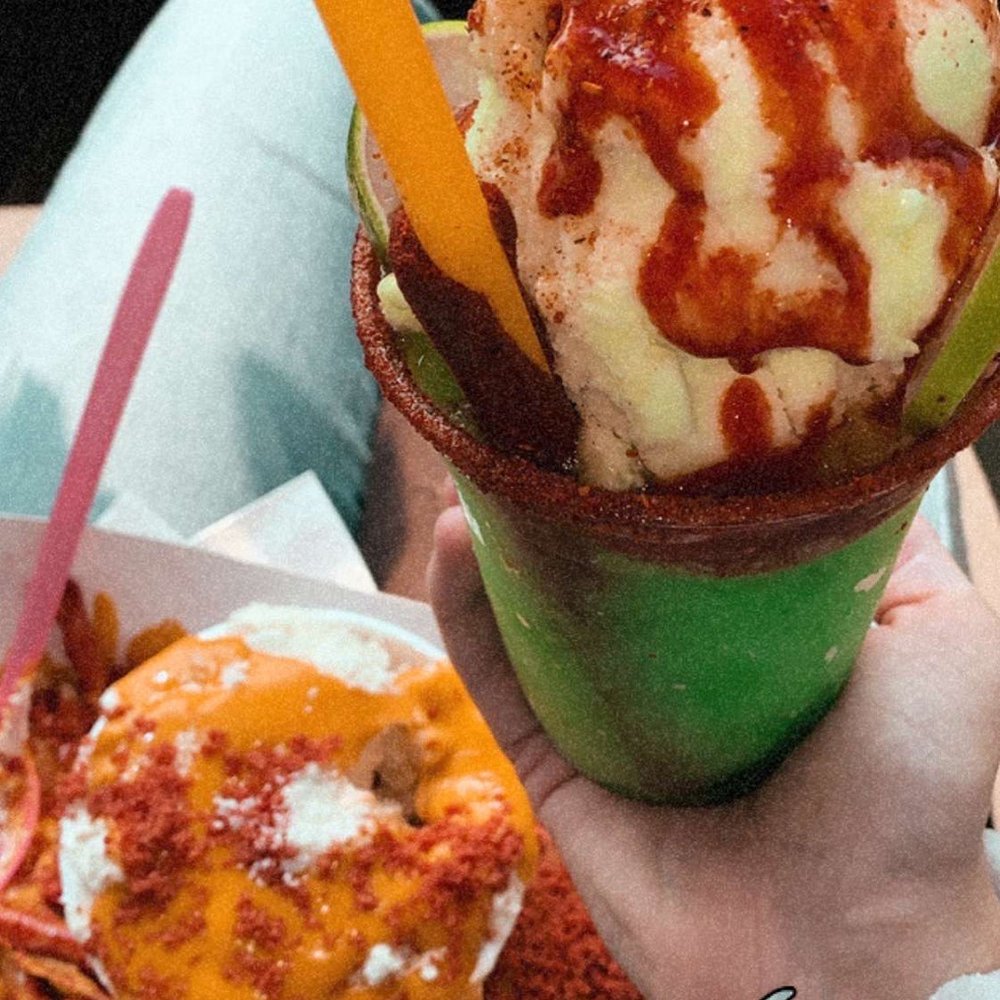 Slushy Lime with Lime Ice cream and the Corn with mayo and Takis with cheese on top . Slushy Lime with Lime Ice cream and the Corn with mayo and Takis with cheese on top .