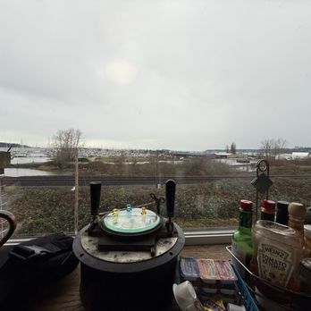 Monte's Just A Bite Cafe - Big window with a nice view of the harbour. I'm sure this would be absolutely beautiful on a clear day. - Breakfast & Brunch Near Me - Blaine, Washington