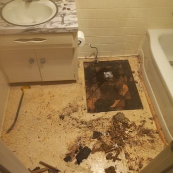 Morrows Discount Flooring Installation - a bathroom with a sink and tub - Flooring Near Me Morrows Discount Flooring Installation - a bathroom with a sink and tub - Flooring Near Me