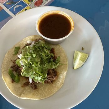 El Mariachi Restaurant Bar - Birria Taco. Not quite like the ones I'm use to with a pan fried shell, but it was good. - Mexican Near Me - Fredericton, New Brunswick El Mariachi Restaurant Bar - Birria Taco. Not quite like the ones I'm use to with a pan fried shell, but it was good. - Mexican Near Me - Fredericton, New Brunswick