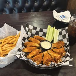 Well done Cajun dry rub wings, awesome crispy seasoned shoestring fries. Both were enhanced by their homemade blue cheese dressing! Well done Cajun dry rub wings, awesome crispy seasoned shoestring fries. Both were enhanced by their homemade blue cheese dressing!