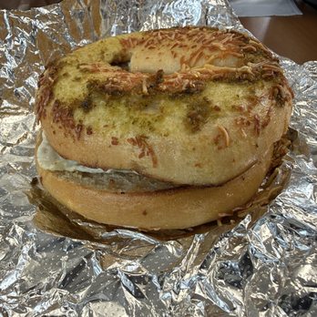 Steve's Bagels - Asiago pesto bagel with sausage, egg, and cheese - Delis Near Me - Manchester, Connecticut Steve's Bagels - Asiago pesto bagel with sausage, egg, and cheese - Delis Near Me - Manchester, Connecticut