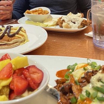 Another Broken Egg Cafe - Al Pastor Benedict with fruit & Broken Egg Biscuit Sandwich with pancakes. - Breakfast & Brunch Near Me - Nashville, Tennessee Another Broken Egg Cafe - Al Pastor Benedict with fruit & Broken Egg Biscuit Sandwich with pancakes. - Breakfast & Brunch Near Me - Nashville, Tennessee