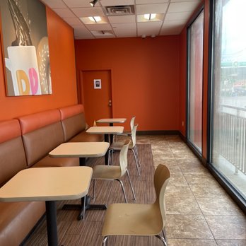 Dunkin' - a view of a restaurant with tables and chairs - Coffee & Tea Near Me - Mount Vernon, New York Dunkin' - a view of a restaurant with tables and chairs - Coffee & Tea Near Me - Mount Vernon, New York