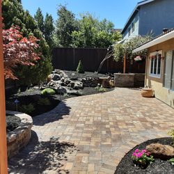 Sunrise Garden Design - Removing all sod to a more functional space.