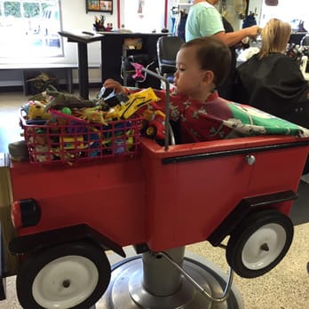 Hair Bears - Enjoying the basket full of toys! - Kids Hair Salons Near Me - Tustin, California Hair Bears - Enjoying the basket full of toys! - Kids Hair Salons Near Me - Tustin, California