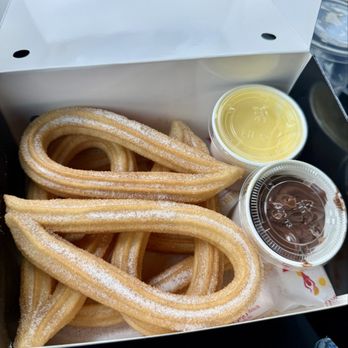 Ole Churros - Henderson - Flamenco combo with 6 churros and two dipping sauces- Nutella and Bavarian cream - Spanish Near Me - Las Vegas, Nevada Ole Churros - Henderson - Flamenco combo with 6 churros and two dipping sauces- Nutella and Bavarian cream - Spanish Near Me - Las Vegas, Nevada