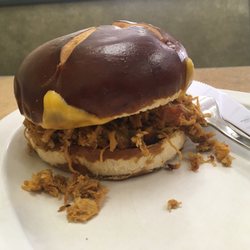 Downtown Deli, Market, Cafe - Pulled pork on a pretzel bun