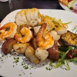 Stuffed Flounder with Shrimp, Stuffed Clams, shredded zucchini, and potatoes.