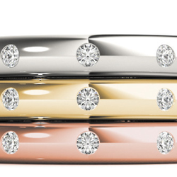 Laney's Diamonds and Jewelry - Diamond bands in white, yellow and pink gold.