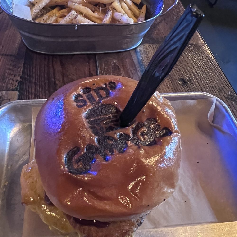 Sids Garage - Whiskey Bacon Burger and Truffle Parm fries - Burgers Near Me - Meridian, Idaho Sids Garage - Whiskey Bacon Burger and Truffle Parm fries - Burgers Near Me - Meridian, Idaho