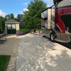 Traverse Bay R V Park - Back patio area overlooking pond
