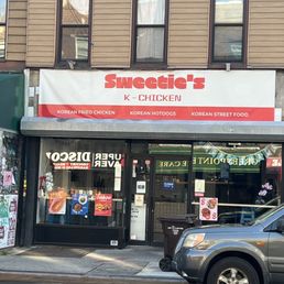 Exterior outside entrance of Sweetie’s K-Chicken - Brooklyn, New York Exterior outside entrance of Sweetie’s K-Chicken - Brooklyn, New York