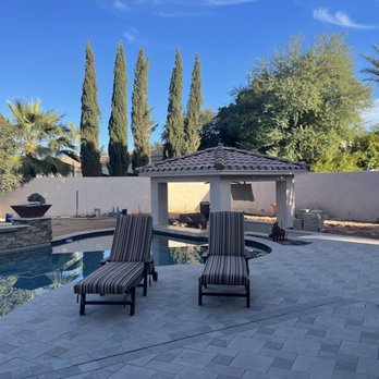 Best Bet Landscape - two lounge chairs facing a pool - Landscaping Near Me Best Bet Landscape - two lounge chairs facing a pool - Landscaping Near Me