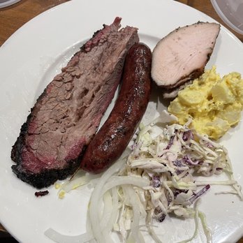 Franklin Barbecue - Brisket, smoked sausage, smoked Turkey, potato salad, and Cole slaw. - Barbeque Near Me - Austin, Texas