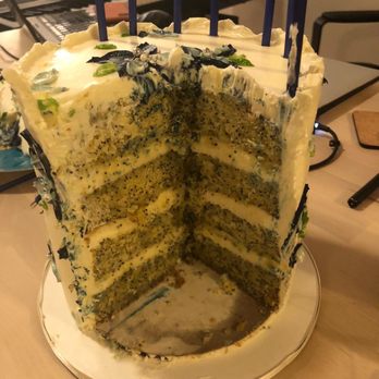 Soul Cake - a slice taken out of a cake - Custom Cakes Near Me