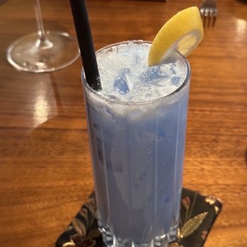 84 Yesler - Cocktail with gin, coconut cream, seltzer, lavender - Italian Near Me - Seattle, Washington