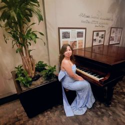 Express Piano Tuning & Repair - My piano player!