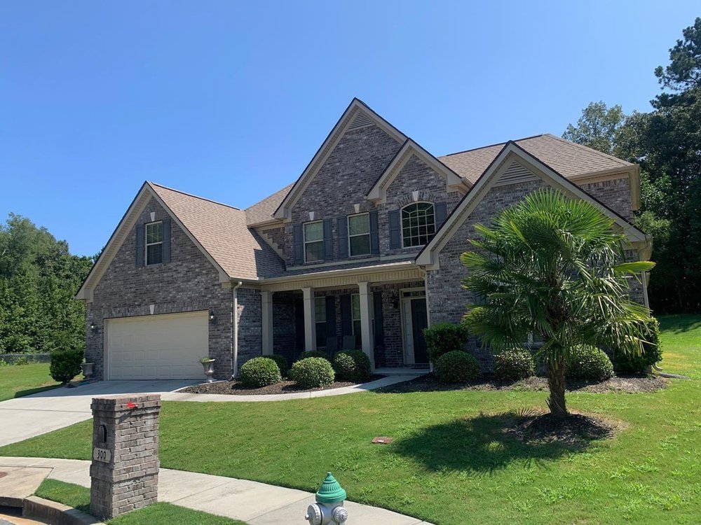 Slide of Firehouse Roofing