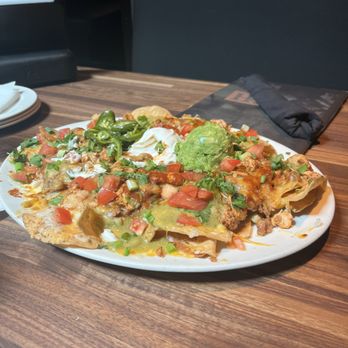 Yard House - Chicken Nachos - New American Near Me - San Antonio, Texas Yard House - Chicken Nachos - New American Near Me - San Antonio, Texas