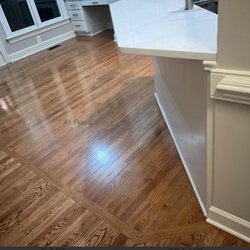 Beautiful brand new solid hardwood floors for Erin from Raleigh, NC's kitchen