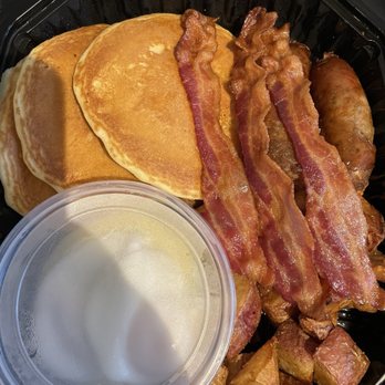 Silver Diner - Pancakes sausage bacon and hash brown. Poached eggs. - New American Near Me - National Harbor, Maryland