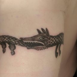 Ouroboros. The picture doesn't do it justice as each scale is individually shaded. Ouroboros. The picture doesn't do it justice as each scale is individually shaded.