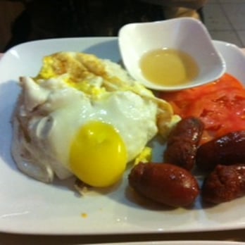 Symphonie Restaurant - Longsilog (Traditional Filipino Breakfast of Sweet Cured Sausage, Garlic Fried Rice, and a Fried Egg). - Filipino Near Me - Vancouver, British Columbia Symphonie Restaurant - Longsilog (Traditional Filipino Breakfast of Sweet Cured Sausage, Garlic Fried Rice, and a Fried Egg). - Filipino Near Me - Vancouver, British Columbia