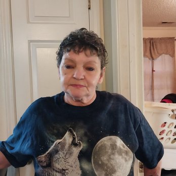 Hot Spot - Clover - a woman in a t - shirt with a howling wolf on it - Gas Stations Near Me - Clover, South Carolina Hot Spot - Clover - a woman in a t - shirt with a howling wolf on it - Gas Stations Near Me - Clover, South Carolina