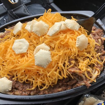 Skyline Chili - a closeup of a skillet with cheese on top - Salad Near Me - Englewood, Ohio Skyline Chili - a closeup of a skillet with cheese on top - Salad Near Me - Englewood, Ohio
