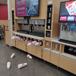 Pilot Travel Center - These cups. I tried to push it in; wouldn't go. Pilot had filled it, then stacked even more sticking out 2 ft + falling off to the floor.