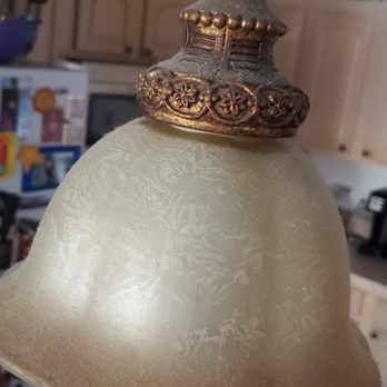 Helping Hands Cleaning Services - light fixtures were included in the quote. This light hangs above the bar top in the kitchen. Easily reachable. - Home Cleaning Near Me