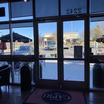 Caffe Capri - Inside looking out the entry doors. - Coffee & Tea Near Me - Boise, Idaho Caffe Capri - Inside looking out the entry doors. - Coffee & Tea Near Me - Boise, Idaho