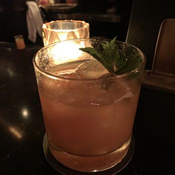 Foreign National - daily dose (orange bc there is carrot in it-- an interesting flavor combo we really liked) - Cocktail Bars Near Me - Seattle, Washington