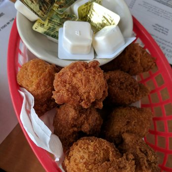 Breezeway Restaurant - Hush puppies and butter (we already had eaten a couple) - Seafood Near Me - Topsail Beach, North Carolina Breezeway Restaurant - Hush puppies and butter (we already had eaten a couple) - Seafood Near Me - Topsail Beach, North Carolina