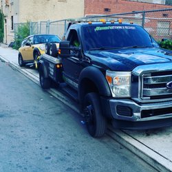 Ahmen's Towing - Picking up a loyal customer vehicle to be dropped off at one of many locations to fix vehicles..