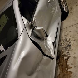 Ding Masters Collision Center - Door only. Fender has been replaced already.  How much?