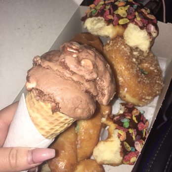 USA Donuts & Croissants - a hand holding a cone of ice cream - Donuts Near Me - El Monte, California USA Donuts & Croissants - a hand holding a cone of ice cream - Donuts Near Me - El Monte, California