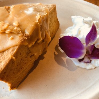 Rekindle Coffee - Seasonal pumpkin scones with a dollop of fresh whipped cream. - Cafes Near Me - Orange, California