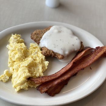 Big Spring Cafe - 2 Eggs, Country fried steak, a side of bacon. Amazing. - Burgers Near Me - Huntsville, Alabama
