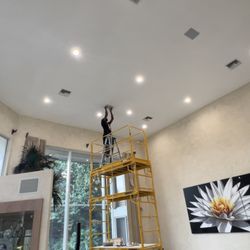 Five Star Popcorn Removal - Five Star Popcorn Removal high ceiling perfect smooth. Also prime and paint.